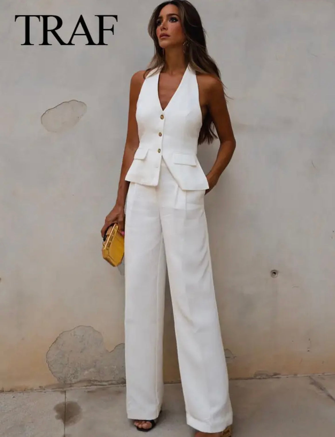 Traje blanco de chaleco y pantalón